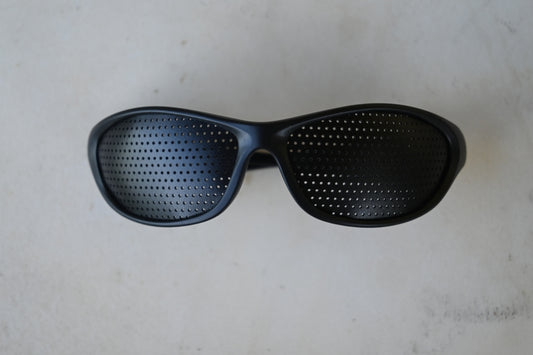 Glasses with Small Conical Holes